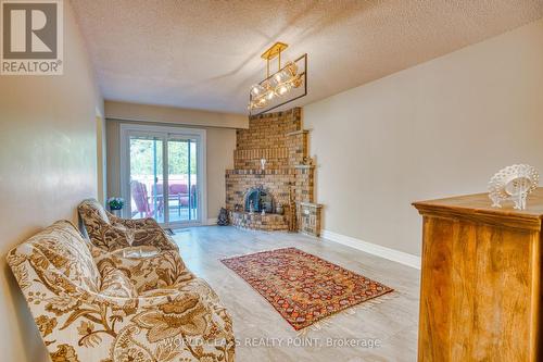 22 Madelaine Crescent, Brampton, ON - Indoor Photo Showing Living Room With Fireplace