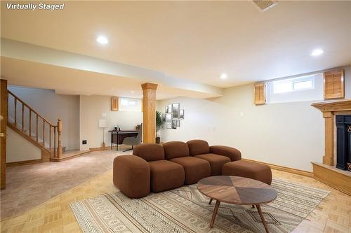 11 Glengarry Road, St. Catharines, ON - Indoor Photo Showing Basement With Fireplace