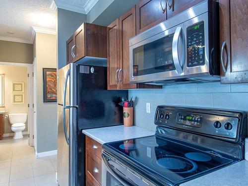 209-7088 West Saanich Rd, Central Saanich, BC - Indoor Photo Showing Kitchen With Double Sink