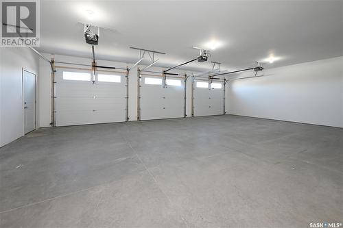 9 2330 Morsky Drive, Estevan, SK - Indoor Photo Showing Garage