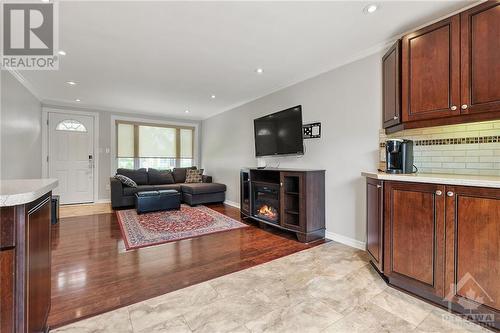 1493 Queenswood Crescent, Ottawa, ON - Indoor Photo Showing Living Room With Fireplace