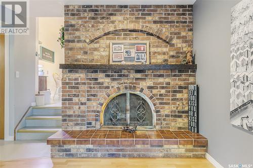 106 Pappas Crescent, Regina, SK - Indoor Photo Showing Other Room With Fireplace