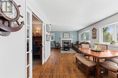 26 Cretney Drive, Prince Edward County, ON - Indoor Photo Showing Dining Room With Fireplace