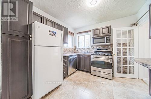 39 Rockport Crescent, Richmond Hill, ON - Indoor Photo Showing Kitchen With Upgraded Kitchen