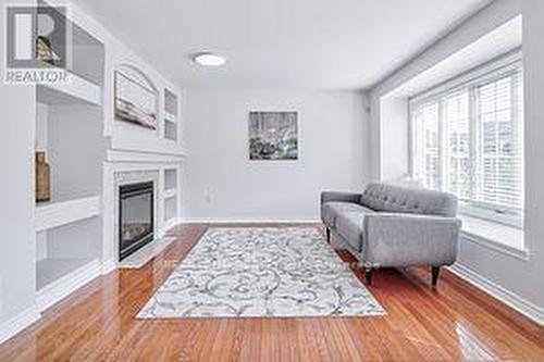 39 Roy Rainey Avenue, Markham, ON - Indoor Photo Showing Living Room With Fireplace