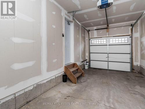 86 - 975 Whitlock, Milton, ON - Indoor Photo Showing Garage