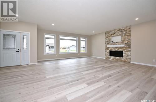 10 2330 Morsky Drive, Estevan, SK - Indoor Photo Showing Living Room With Fireplace