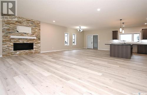 10 2330 Morsky Drive, Estevan, SK - Indoor Photo Showing Living Room With Fireplace