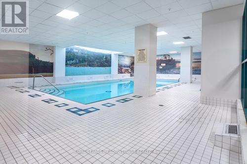 1405 - 100 Millside Drive, Milton, ON - Indoor Photo Showing Other Room With In Ground Pool