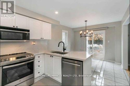 66 Hutton Place, Clarington, ON - Indoor Photo Showing Kitchen With Stainless Steel Kitchen With Double Sink