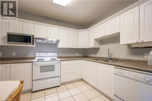 255 Keats Way Unit# 507, Waterloo, ON - Indoor Photo Showing Kitchen With Double Sink