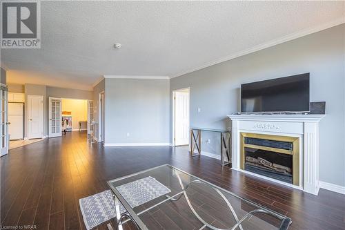 255 Keats Way Unit# 507, Waterloo, ON - Indoor Photo Showing Living Room With Fireplace