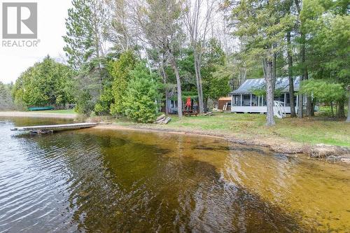 689 Riverside Drive, Combermere, ON - Outdoor With Body Of Water