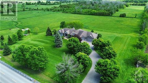 Drone Photo showing large Driveway with ample Parking - 6980 Mansfield Road, Stittsville, ON - Outdoor With View