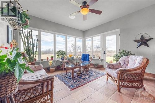 Warm and Bright Sunroom - 6980 Mansfield Road, Stittsville, ON - Indoor Photo Showing Living Room