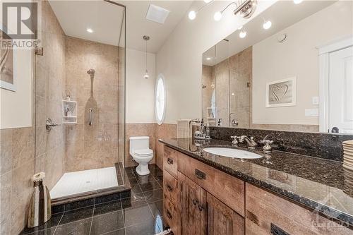 Main Bathroom with Glass Shower, and a beautiful vanity with tons of Storage and Granite Counters - 6980 Mansfield Road, Stittsville, ON - Indoor Photo Showing Bathroom