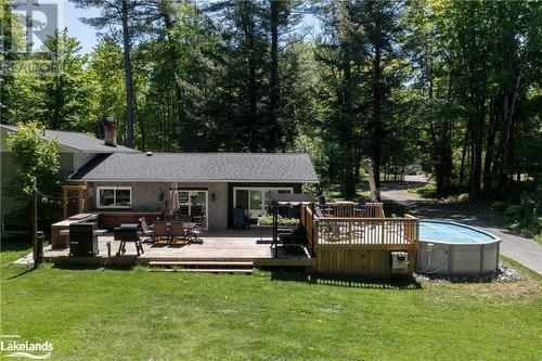 98 Clearwater Lake Road, Port Sydney, ON - Outdoor With Above Ground Pool With Deck Patio Veranda With Exterior