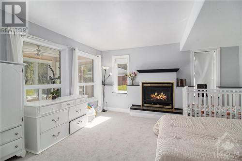 The Rec Room is currently being used as a bedroom. - 202 Grey Fox Drive, Ottawa, ON - Indoor With Fireplace
