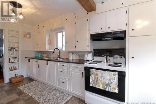 155 Main Street, Chipman, NB - Indoor Photo Showing Kitchen With Double Sink