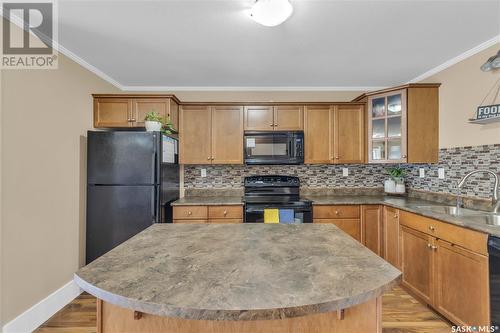 1405 715 Hart Road, Saskatoon, SK - Indoor Photo Showing Kitchen With Double Sink