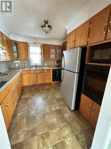 18 Oceanview Lane, Port Aux Basques, NL - Indoor Photo Showing Kitchen With Double Sink