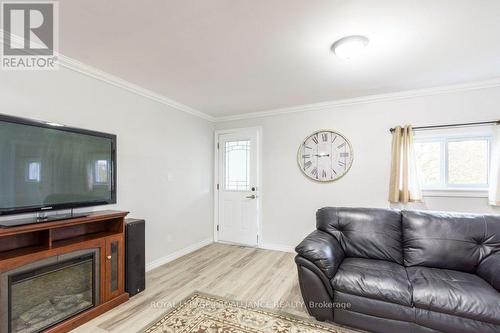 23B Mothers Road, Tweed, ON - Indoor Photo Showing Living Room With Fireplace