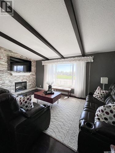 270 2Nd Avenue Se, Swift Current, SK - Indoor Photo Showing Living Room With Fireplace