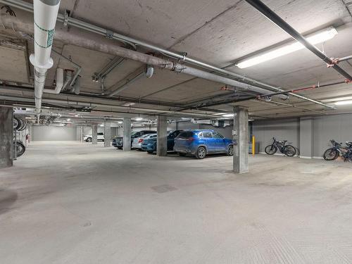 Parking - 102-235 Rue St-Vallier E., Québec (La Cité-Limoilou), QC - Indoor Photo Showing Garage