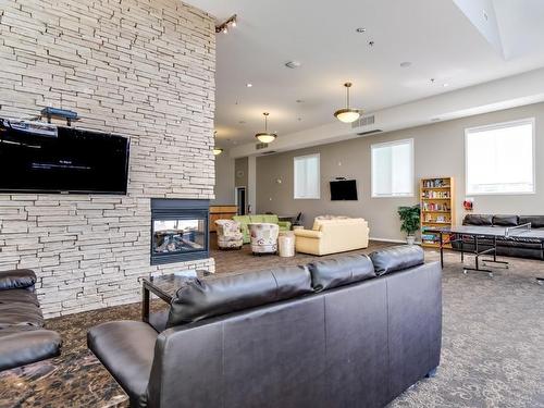 430-1088 Sunset Drive, Kelowna, BC - Indoor Photo Showing Living Room With Fireplace