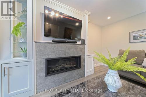18 Burrows Court, Brampton, ON - Indoor Photo Showing Living Room With Fireplace