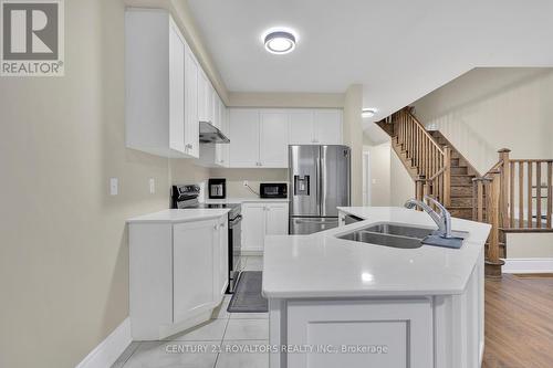 11 Bushwood Trail, Brampton, ON - Indoor Photo Showing Kitchen With Double Sink