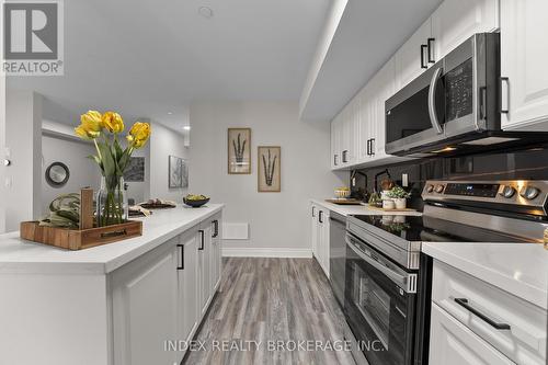 14 - 150 Long Branch Avenue, Toronto, ON - Indoor Photo Showing Kitchen