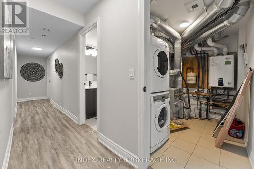 14 - 150 Long Branch Avenue, Toronto, ON - Indoor Photo Showing Laundry Room