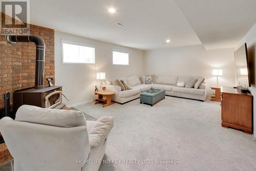 4 Green Pine Avenue, Springwater, ON - Indoor Photo Showing Living Room