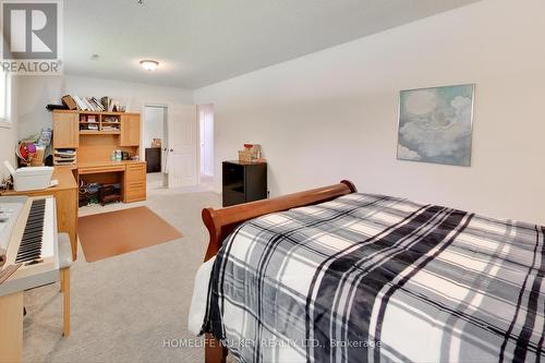 4 Green Pine Avenue, Springwater, ON - Indoor Photo Showing Bedroom