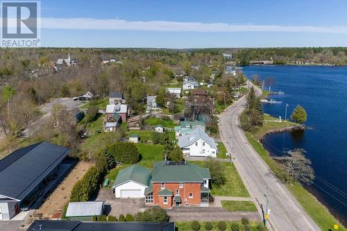 Looking toward Highway 511. Picnic area far RT across bridge. - 1094 Madawaska Street, Calabogie, ON - Outdoor With Body Of Water With View