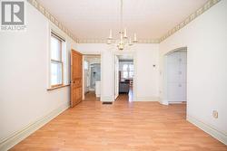 Main floor bathroom. Living room ahead. - 