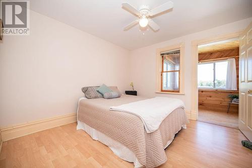 2nd bedroom facing lake with access to balcony. - 1094 Madawaska Street, Calabogie, ON - Indoor Photo Showing Bedroom