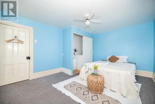 Closet has been converted into a 2 pce bathroom. - 1094 Madawaska Street, Calabogie, ON - Indoor Photo Showing Bedroom