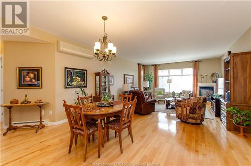 163 Royal Oaks Blvd Unit#204, Moncton, NB - Indoor Photo Showing Dining Room With Fireplace