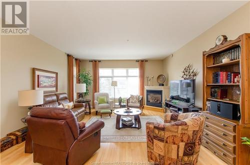 163 Royal Oaks Blvd Unit#204, Moncton, NB - Indoor Photo Showing Living Room With Fireplace