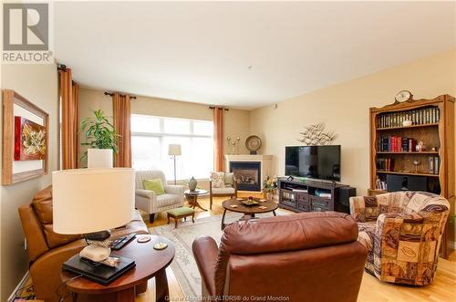 163 Royal Oaks Blvd Unit#204, Moncton, NB - Indoor Photo Showing Living Room With Fireplace