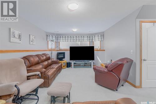 3322 37Th Street W, Saskatoon, SK - Indoor Photo Showing Living Room With Fireplace