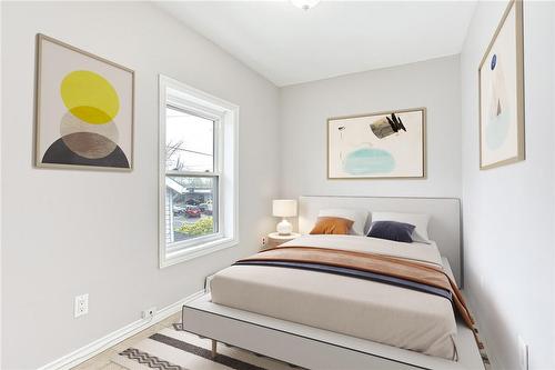 Virtually Staged - 206 Church Street|Unit #Upper, St. Catharines, ON - Indoor Photo Showing Bedroom