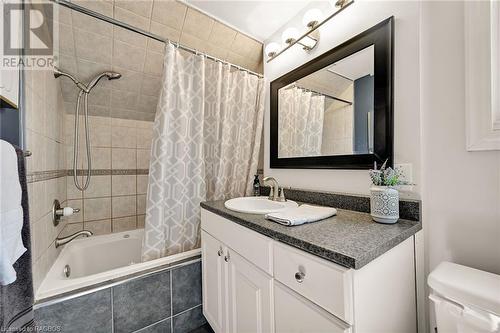 Updated and stylish second floor washroom. - 15 Newlands Avenue, Hamilton, ON - Indoor Photo Showing Bathroom