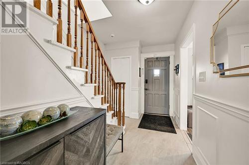 Greet guests in your ample sized foyer...yes there is even a coat closet! - 15 Newlands Avenue, Hamilton, ON - Indoor Photo Showing Other Room