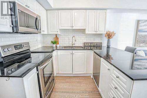 520 - 25 Laidlaw Street, Toronto, ON - Indoor Photo Showing Kitchen With Upgraded Kitchen