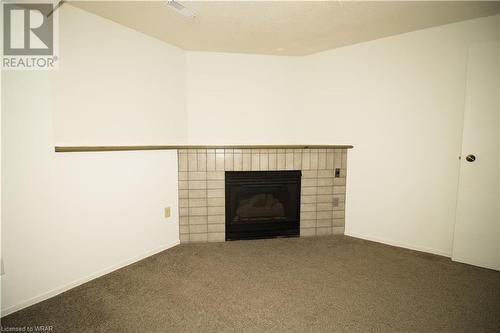 Recreation room - 365 Pioneer Drive Unit# 22, Kitchener, ON - Indoor With Fireplace