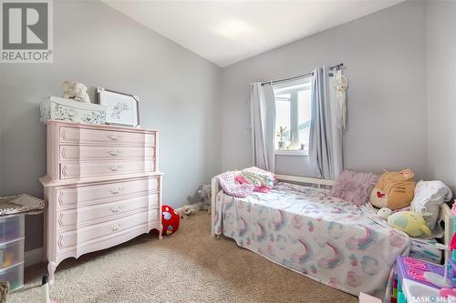 405 Clubhouse Boulevard W, Warman, SK - Indoor Photo Showing Bedroom