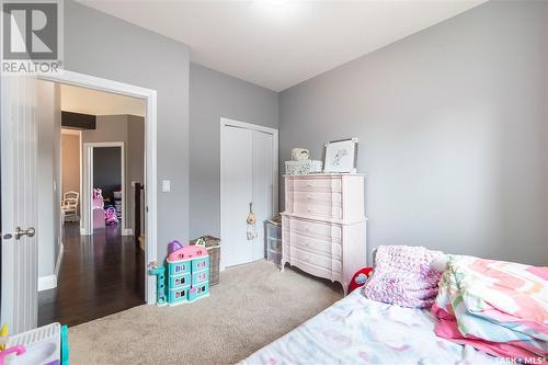 405 Clubhouse Boulevard W, Warman, SK - Indoor Photo Showing Bedroom